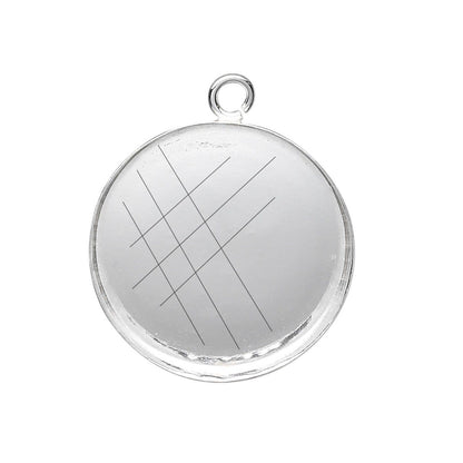 A round silver-toned metal pendant or charm with a small loop at the top and a brushed metallic surface featuring a simple geometric line pattern, shown on a plain white background.
