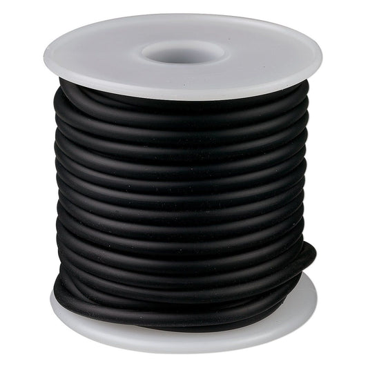 A spool of thick black electrical wire or cable wound around a white plastic core, shown against a plain white background.