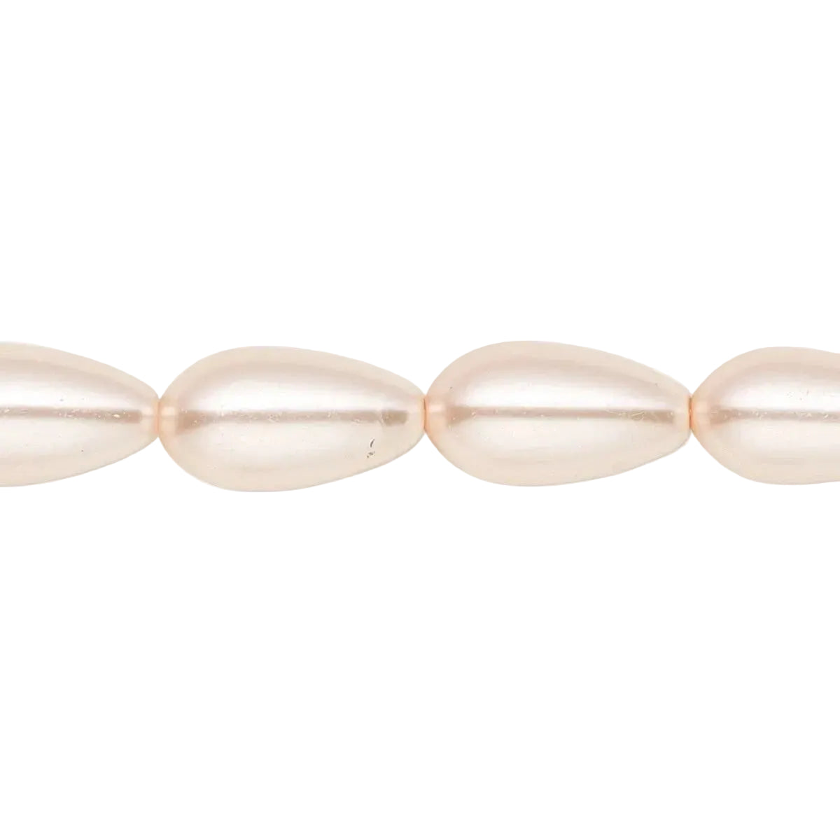 A close-up of a strand of teardrop-shaped freshwater pearls in a soft champagne color, shown against a plain white background.