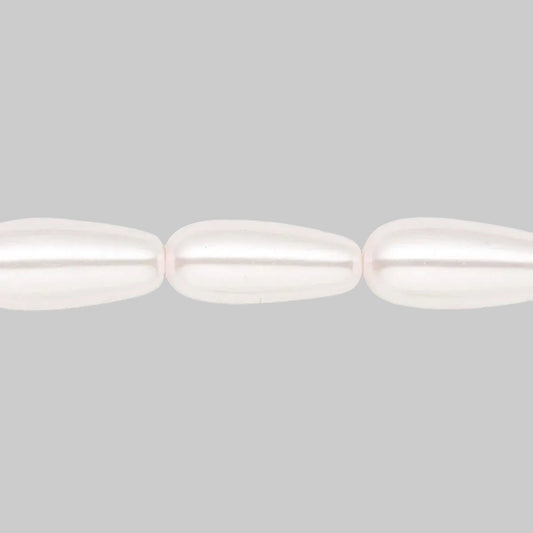 Three elongated teardrop-shaped beads with a lustrous, pearlescent finish in a soft off-white color, shown against a solid white background.