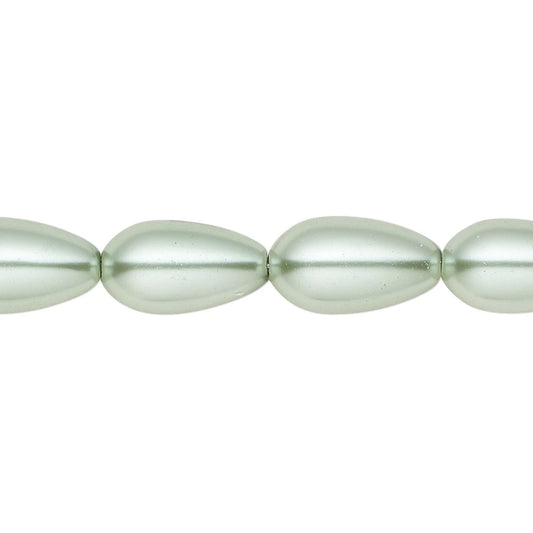 A close-up of a strand of elongated, teardrop-shaped beads with a glossy, pearlescent finish in a pale sage green color, set against a plain white background.