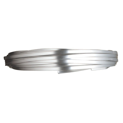 A coiled roll of metallic silver ribbon or tape, shown horizontally against a plain white background.