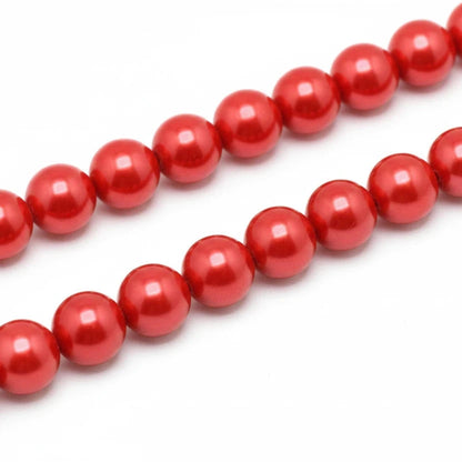 Red glossy round beads strung in two horizontal rows on a light gray background.