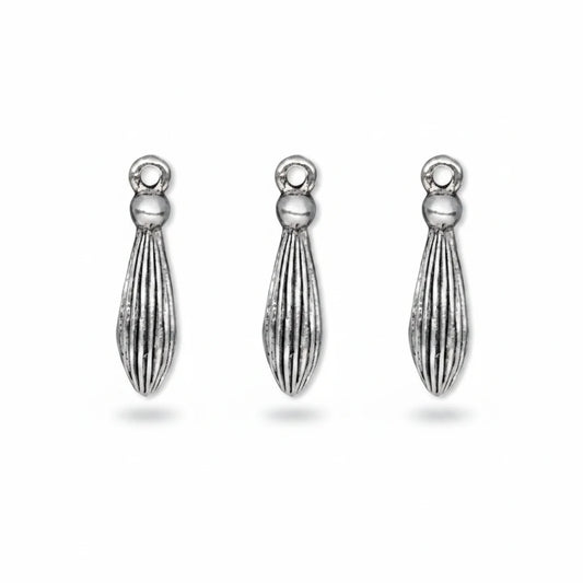 A small silver-toned metal charm with a textured, ribbed teardrop shape and a loop at the top, shown on a plain white background.