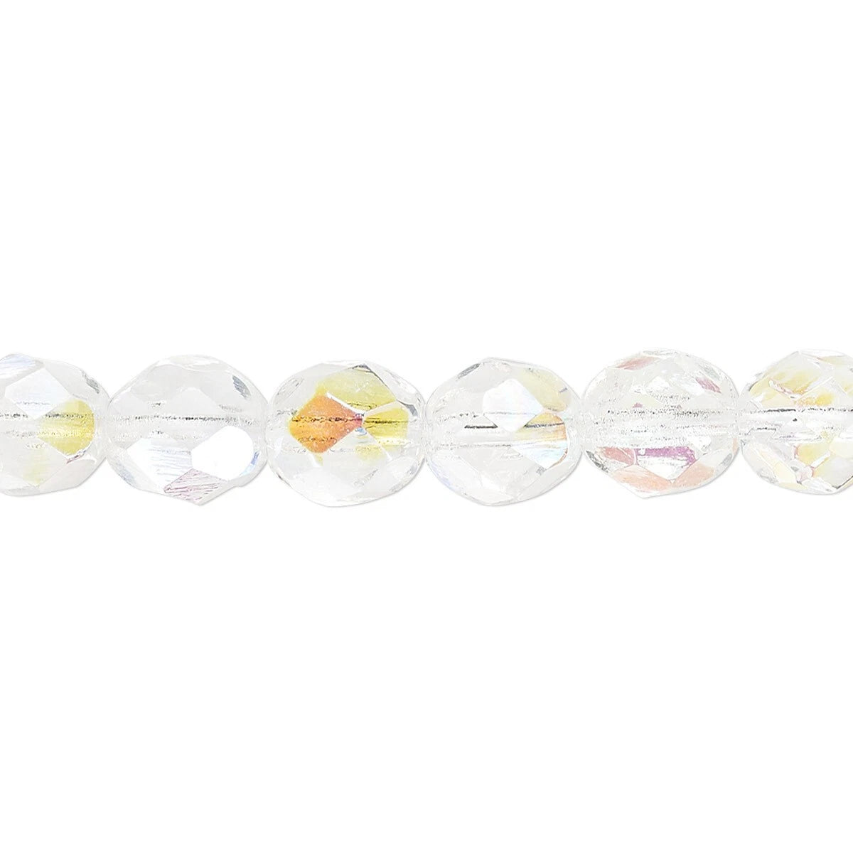 A close-up of faceted clear glass beads with a subtle iridescent yellow and pink cast, strung horizontally on a white background.
