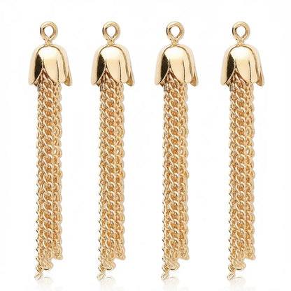 Four gold-tone flower-shaped pendant charms with long dangling chain tassels, shown on a plain white background.
