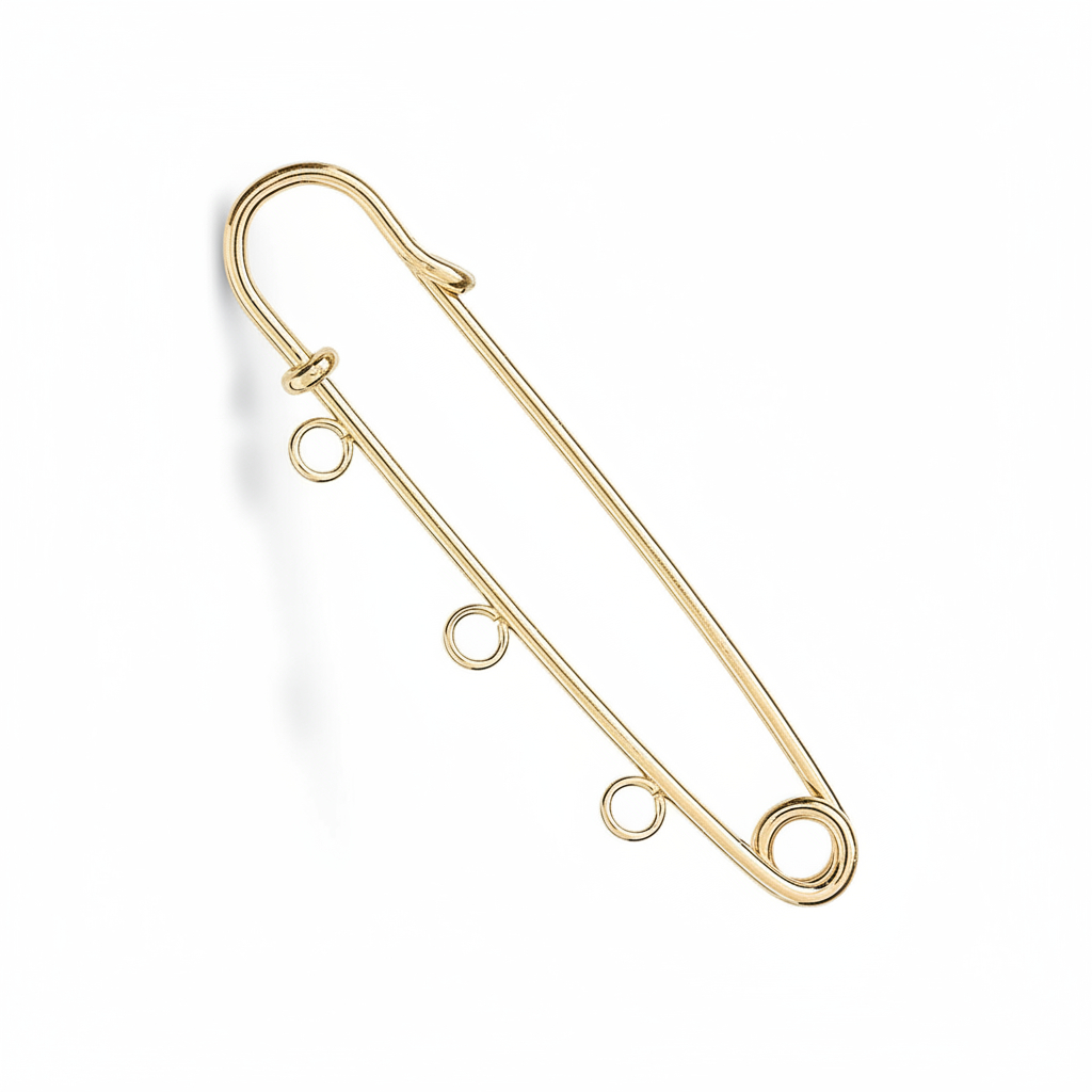 A gold safety pin style pendant or charm with three small hanging loops along the bottom bar, shown on a plain white background.