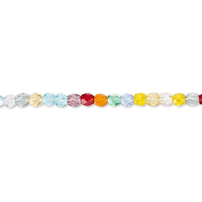 A strand of faceted round beads in a rainbow color sequence, including light blue, yellow, orange, red, pink, and clear beads, laid horizontally on a white background.
