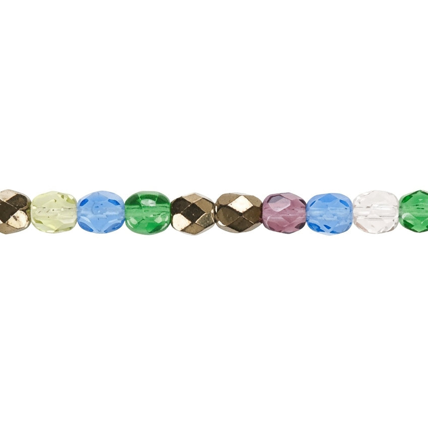 A close-up horizontal view of faceted round beads in assorted colors including green, gold, blue, brown, pink, and clear, set against a plain white background.