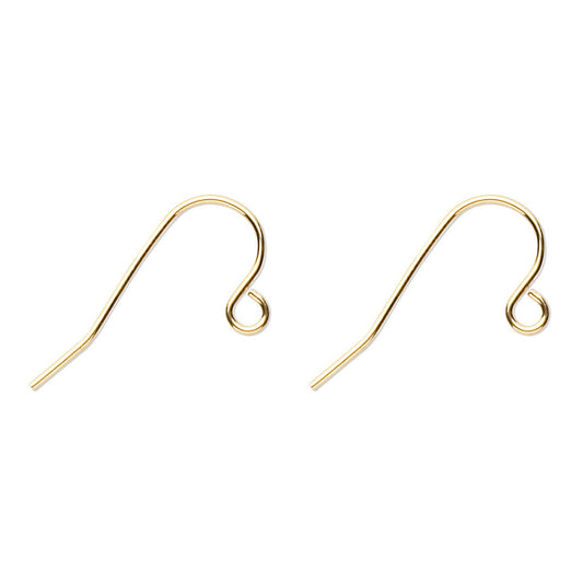 Two gold earring hooks on a white background