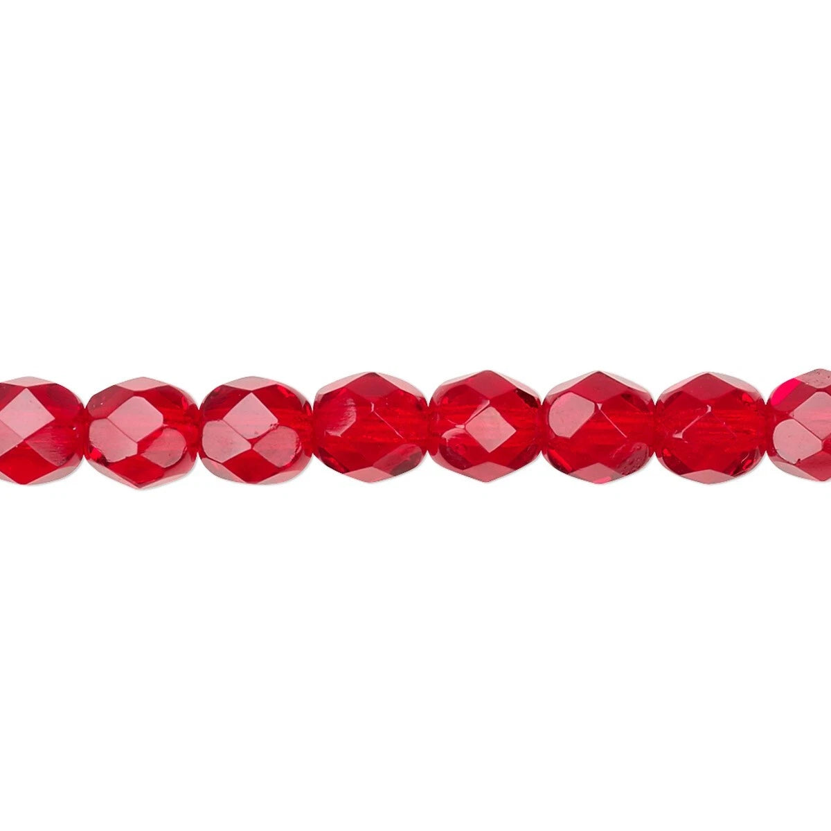 A close-up horizontal line of faceted red beads on a plain white background.