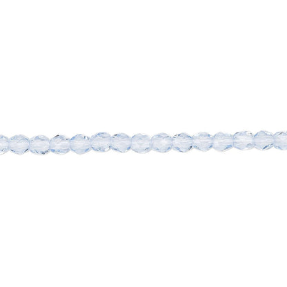 A single strand of light blue faceted round beads laid horizontally on a plain white background.