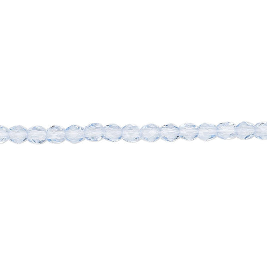 A single strand of light blue faceted round beads laid horizontally on a plain white background.