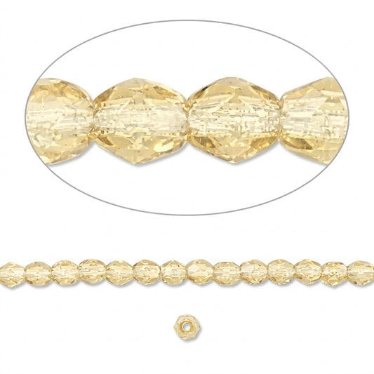 Gold faceted round beads shown on a white background, with a close-up oval inset of several beads and a single bead below.