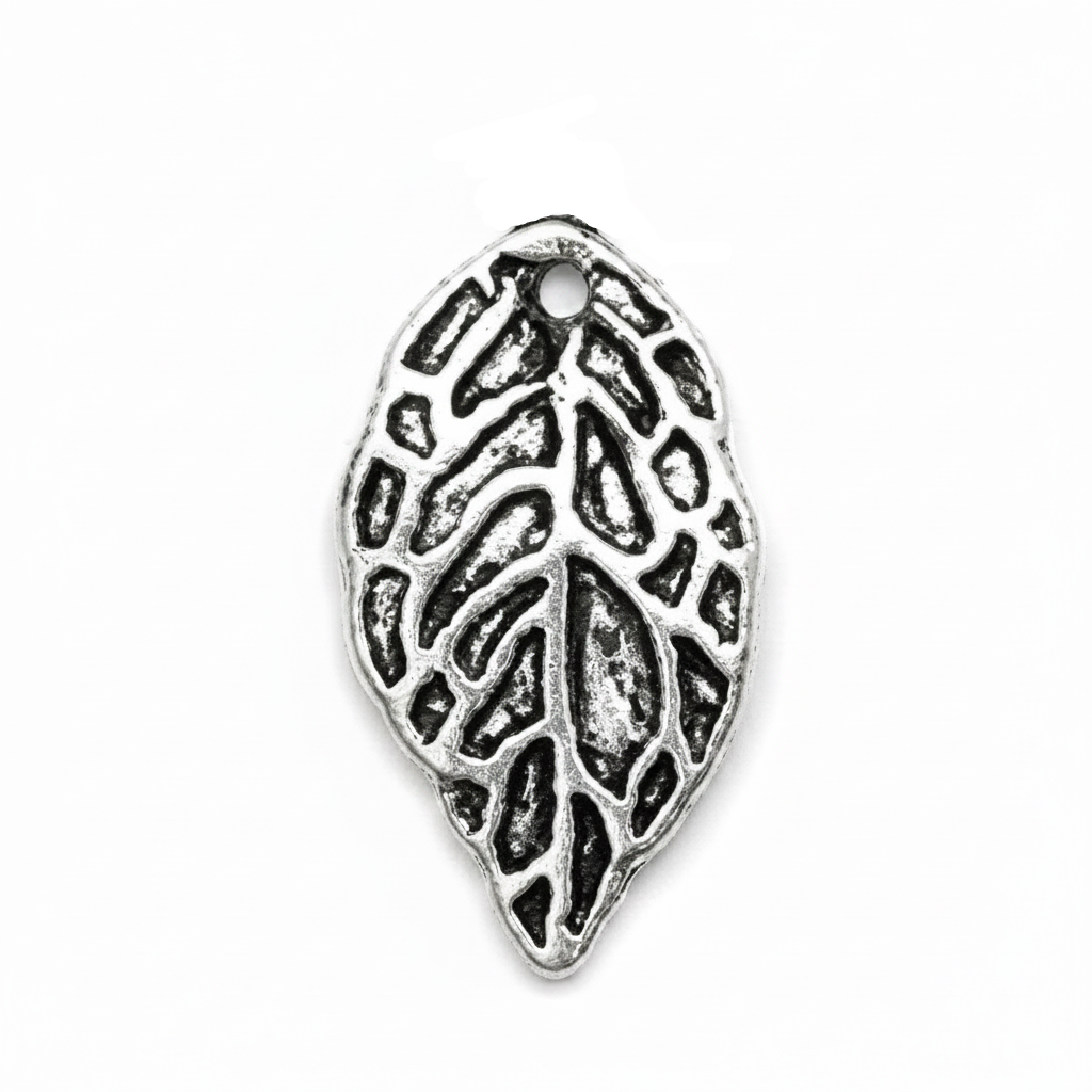 An antique silver leaf-shaped jewelry charm with an embossed leaf pattern and a top loop, shown on a plain white background.