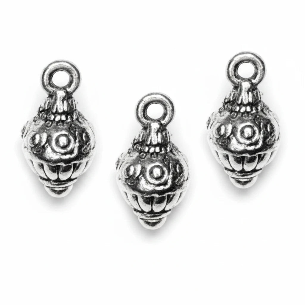 Three silver-toned metal bead charms with a detailed floral and leaf pattern, arranged on a plain white background.