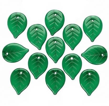 A glossy green teardrop-shaped pendant with an embossed leaf design and a small hole at the top, shown on a plain white background.