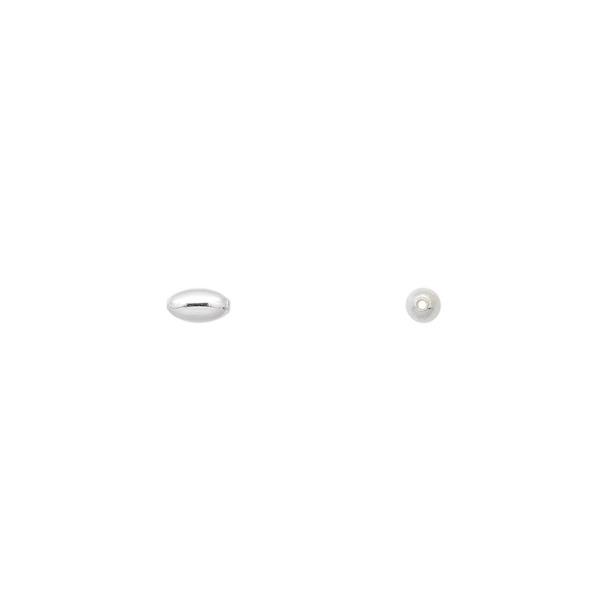 Two small silver beads shown side by side on a plain white background.