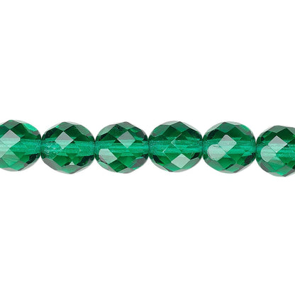 A close-up of a single strand of faceted green glass beads on a plain white background.