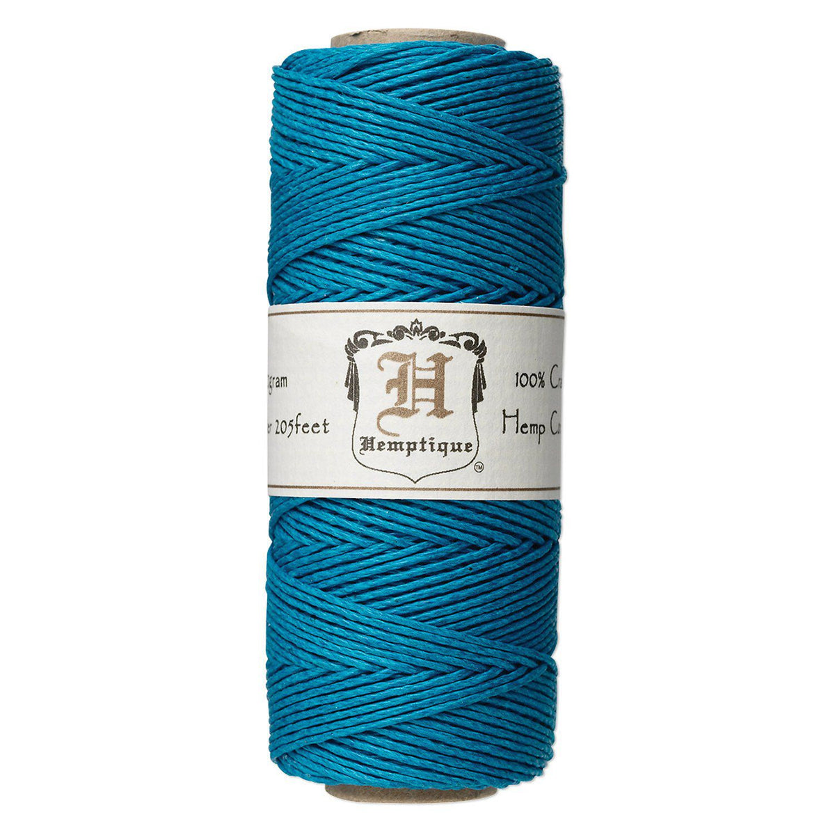A spool of bright teal blue hemp cord with a white paper label in the center, photographed on a solid white background.