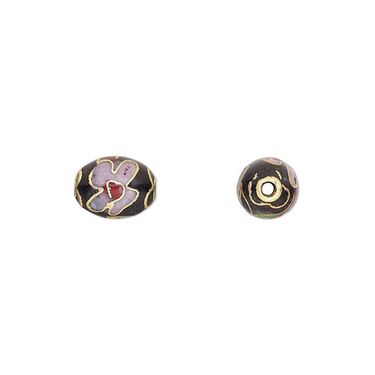 Two round beads with decorative patterns on a white background