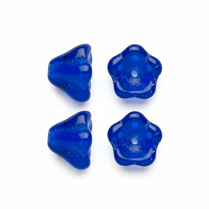 4 blue translucent flower-shaped beads shown on a plain white background, with three from the front and two angled side views. Two of the side views have dashed lines extending from them.