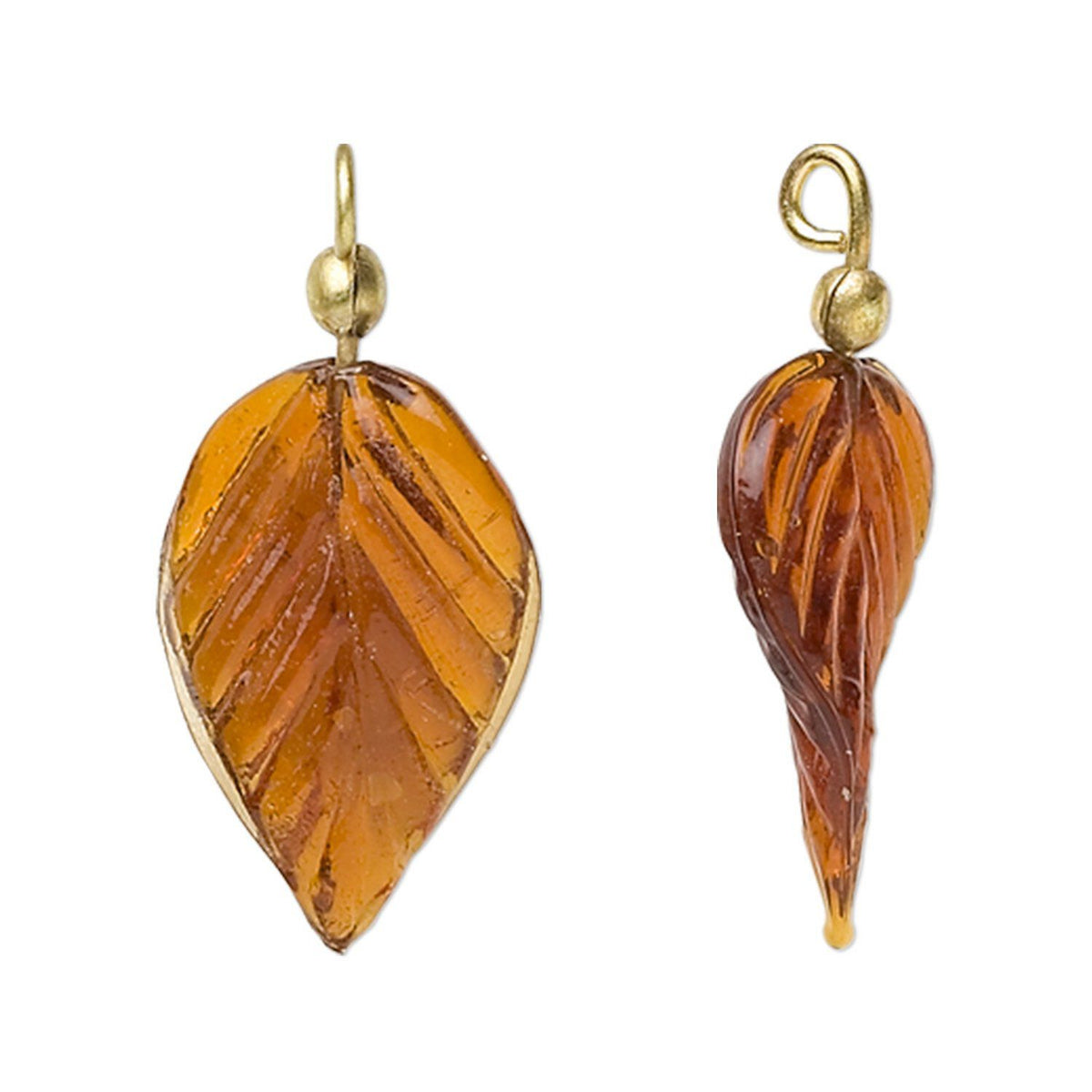 A pair of amber leaf-shaped drop earrings with gold-tone metal settings and hooks, shown on a plain white background.