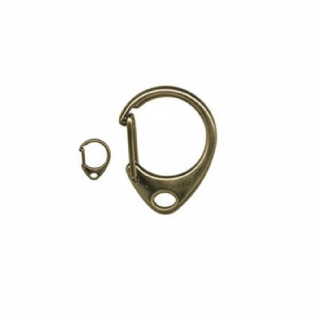 A close-up of a brass-toned metal carabiner clip and a smaller matching ring component on a white background with the text 'Close-up' below.