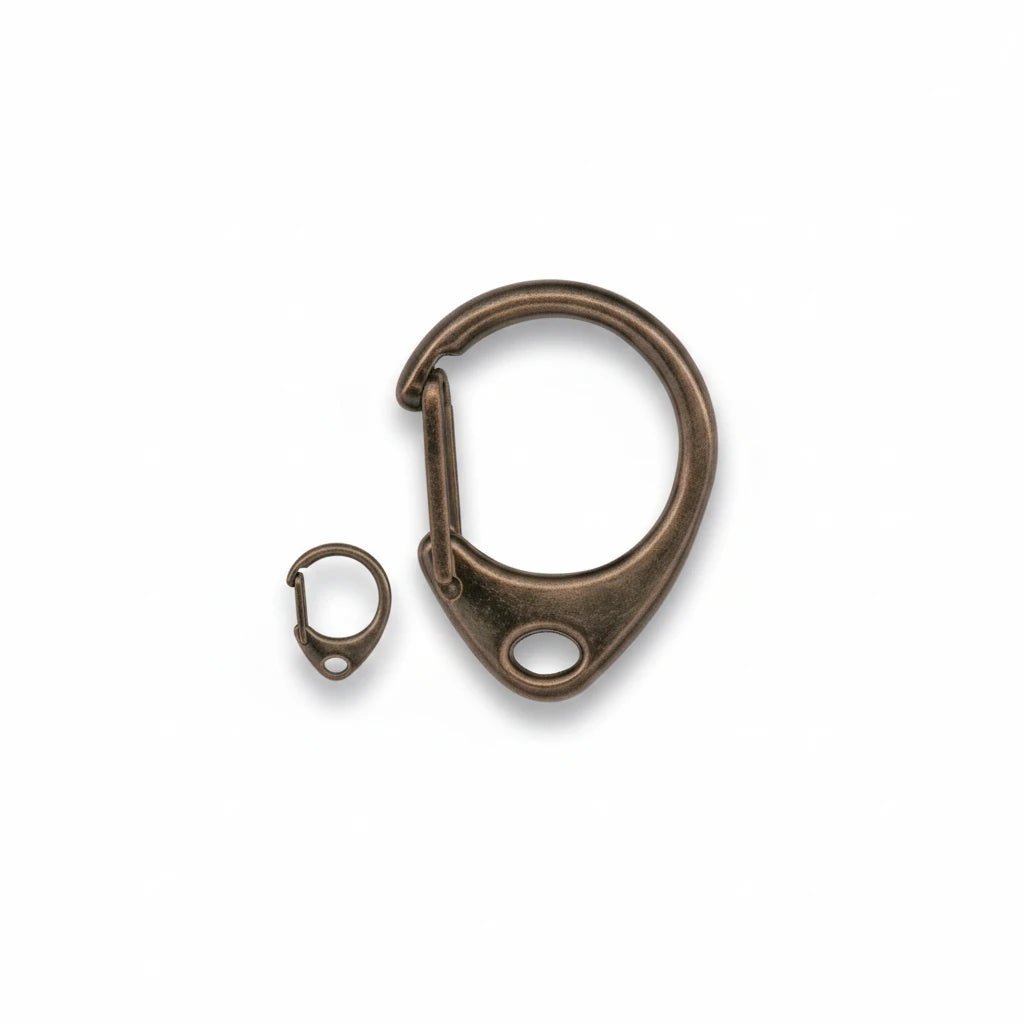 A close-up of a bronze-toned metal carabiner clip with a small matching ring and the text 'Close-up' below, on a plain white background.