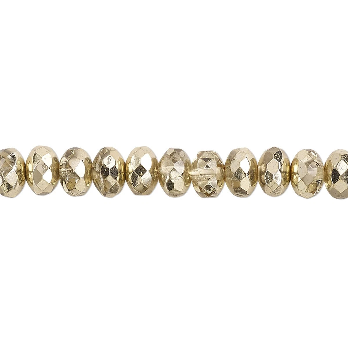 A close-up horizontal line of faceted gold beads on a plain white background.