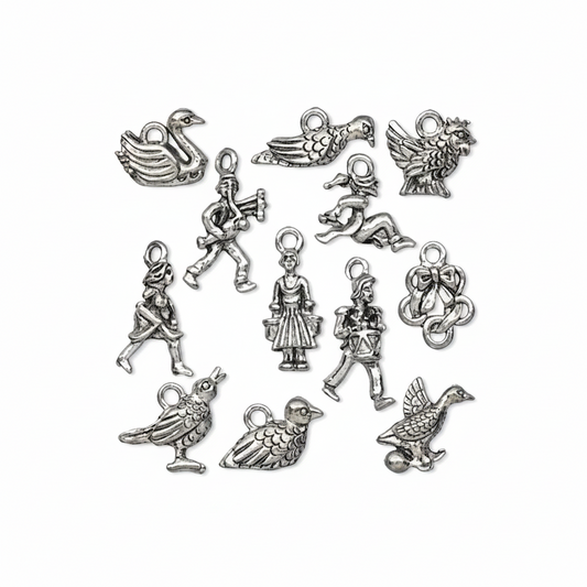 A set of 12 silver-toned metal jewelry charms with various animal and human figure designs, arranged on a plain white background.