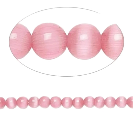 Pink round beads shown in a close-up oval inset and as a strand on a white background.