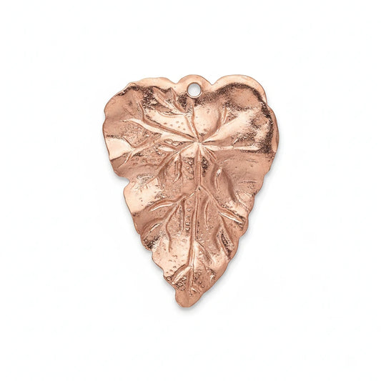 A single heart-shaped metallic charm with a leaf-like embossed pattern and a small hanging hole, shown on a plain white background.