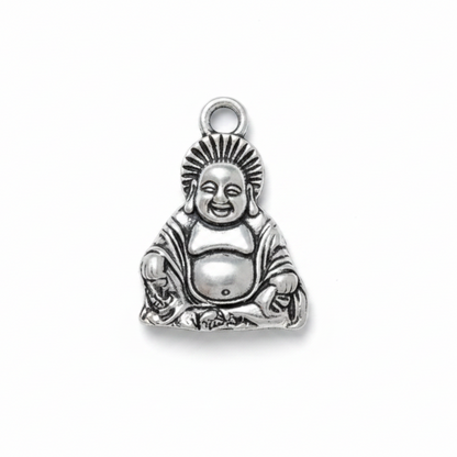 A silver-toned metal Buddha charm pendant with a detailed seated Buddha design and a top loop, shown on a plain white background.
