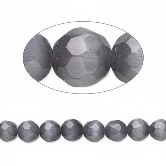 Faceted round beads in a dark gray metallic finish, shown with a close-up oval detail of three beads and a strand of matching beads along the bottom on a white background.