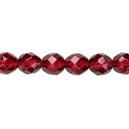 Faceted round beads in a deep red color, shown in a close-up horizontal line on a plain white background.