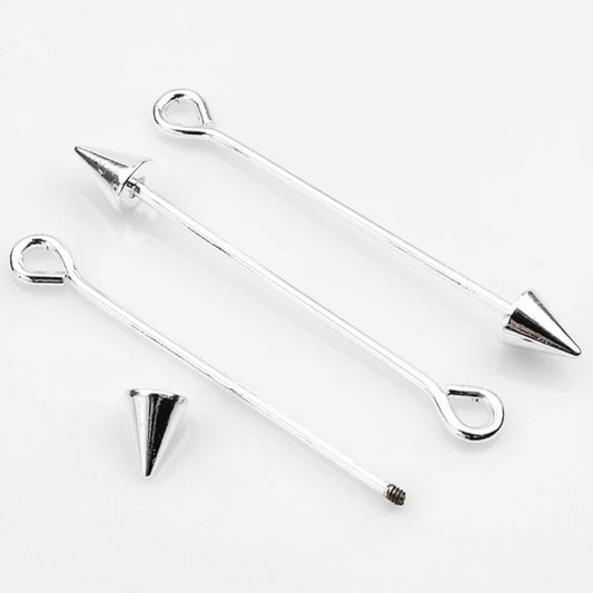 Three silver-toned metal barbell-style findings with looped ends and pointed cone tips, shown on a clean white background. One cone tip is placed separately below.