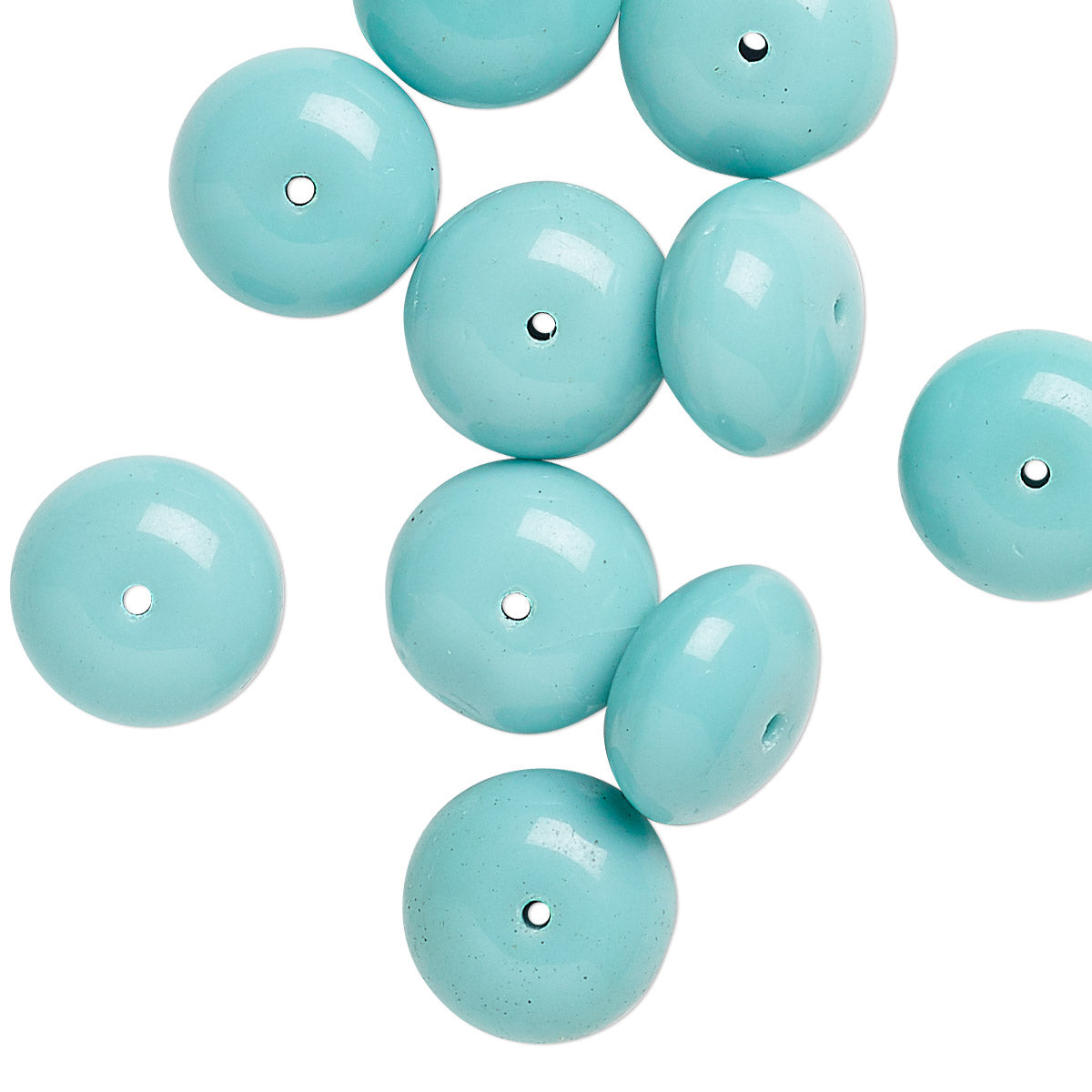 Ten glossy, round turquoise beads with a central hole, scattered on a plain white background.