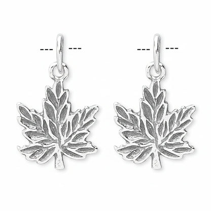 A pair of silver maple leaf dangle earrings with oxidized detailing in the recessed areas, shown against a plain white background.