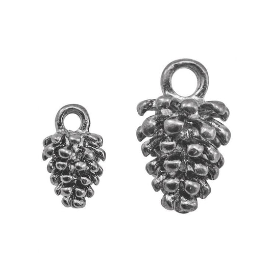 Two silver pine cone charms on a white background