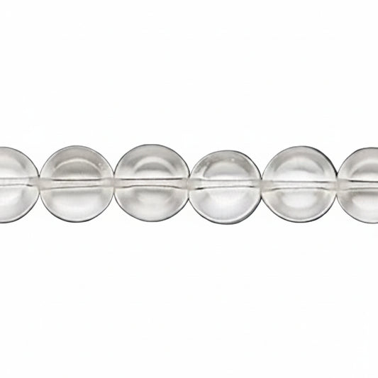 A close-up of a strand of clear, round glass beads on a dark gray background.