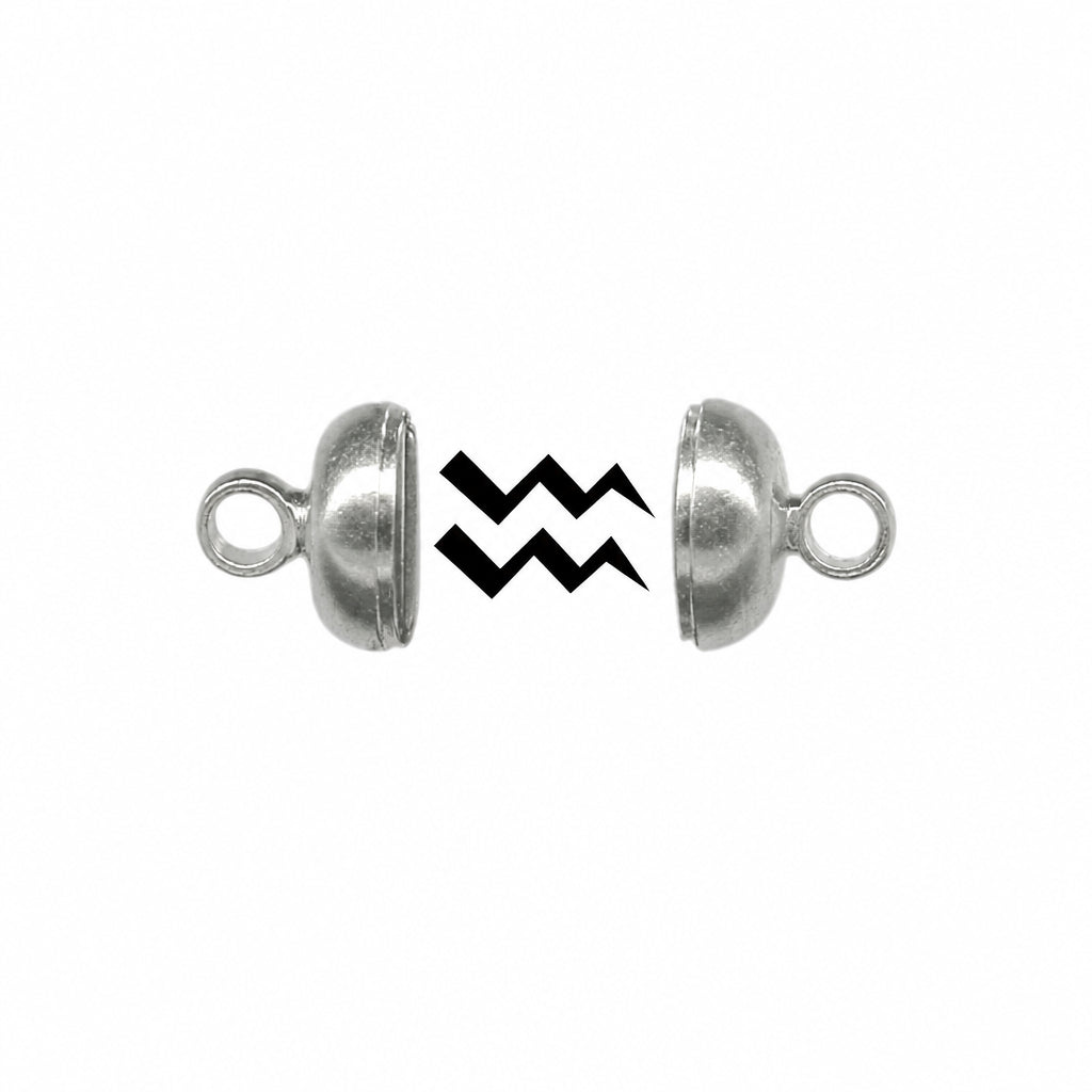 Two silver metal dome-shaped split beads with loop ends, shown apart on a white background with a black zigzag graphic between them.