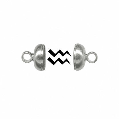 Two silver metal dome-shaped split beads with loop ends, shown apart on a white background with a black zigzag graphic between them.