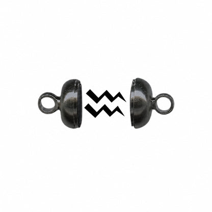 Two black metal split ring connectors with a black chevron graphic overlay in the center, shown on a plain white background.