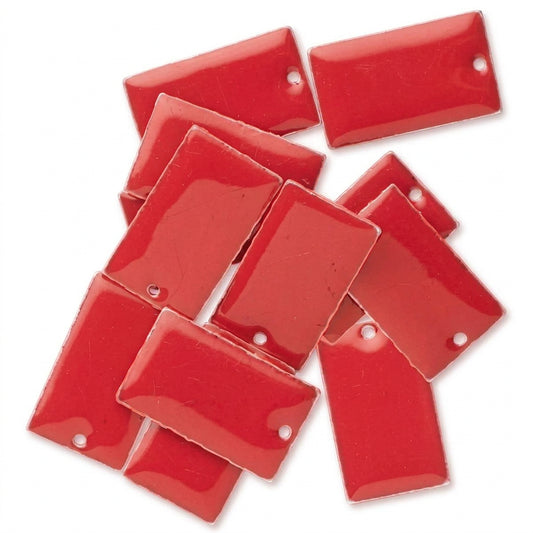 A pile of glossy red rectangular ceramic tiles with small pre-drilled holes, arranged on a plain white background.