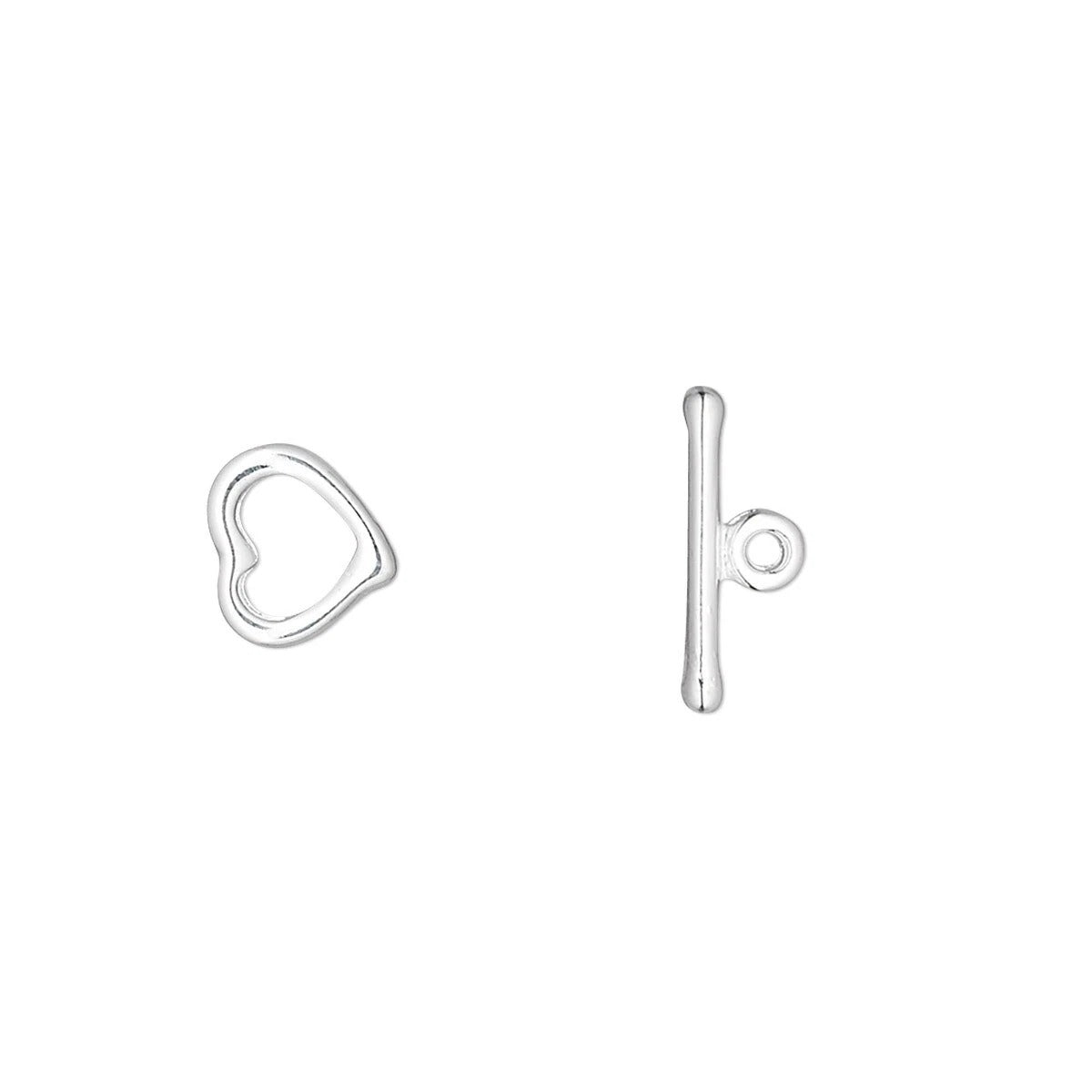 A pair of silver jewelry findings on a plain white background, featuring a small open heart-shaped stud and a matching toggle clasp with a loop.