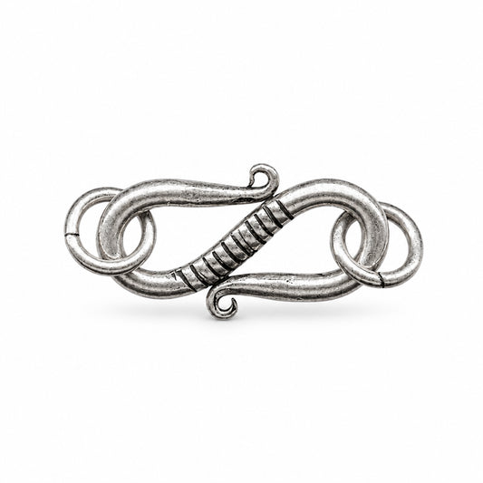 A silver-toned metal toggle clasp with a twisted center section and interlocking loop details, shown on a plain white background.