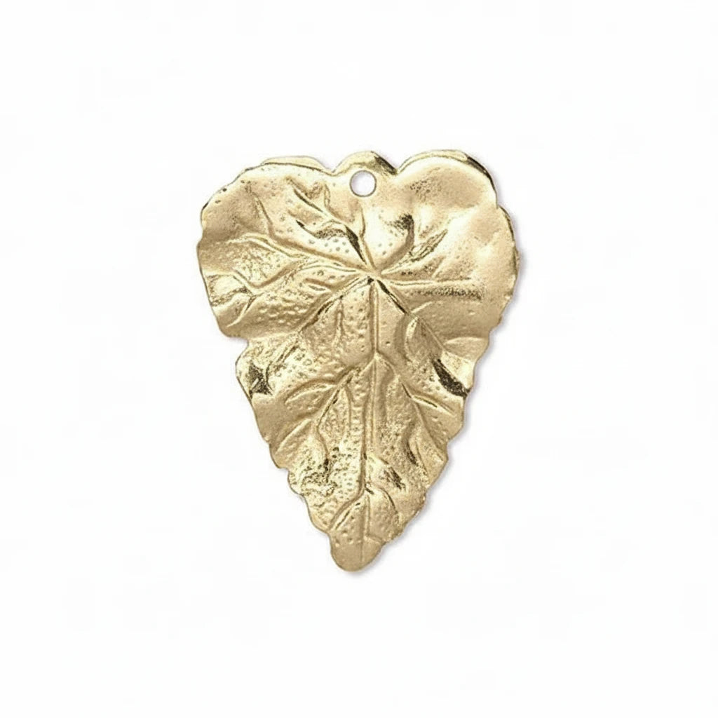 A single metallic gold leaf-shaped pendant with a textured leaf pattern and a small hanging hole at the top, shown on a plain white background.