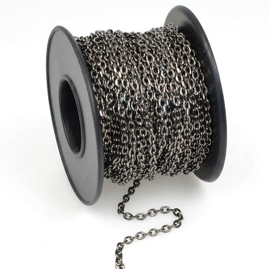 A spool of dark metallic chain links, shown on a clean white background with a short section of the chain draped in front.