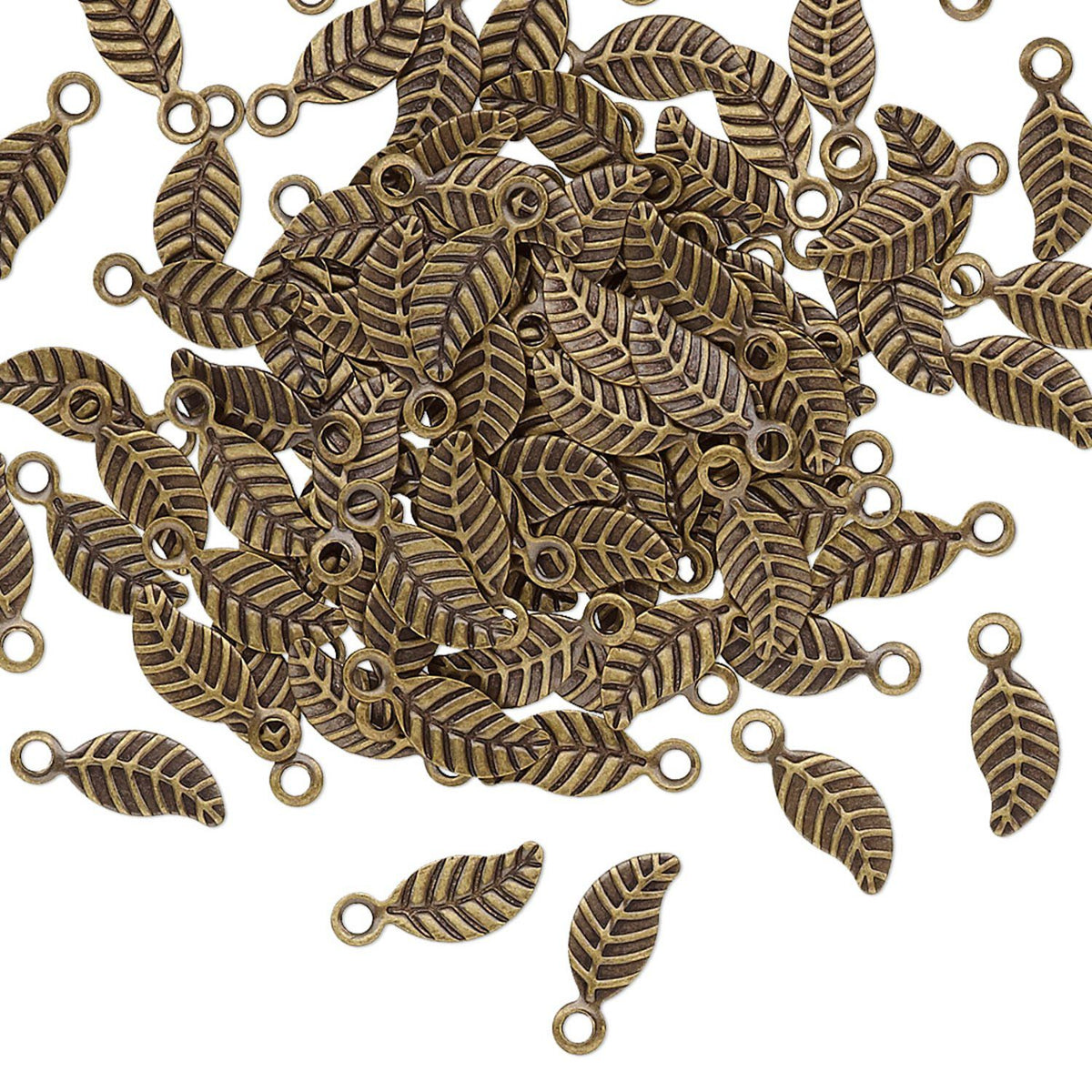 A pile of small leaf-shaped metal charms with loop tops, shown on a plain white background.